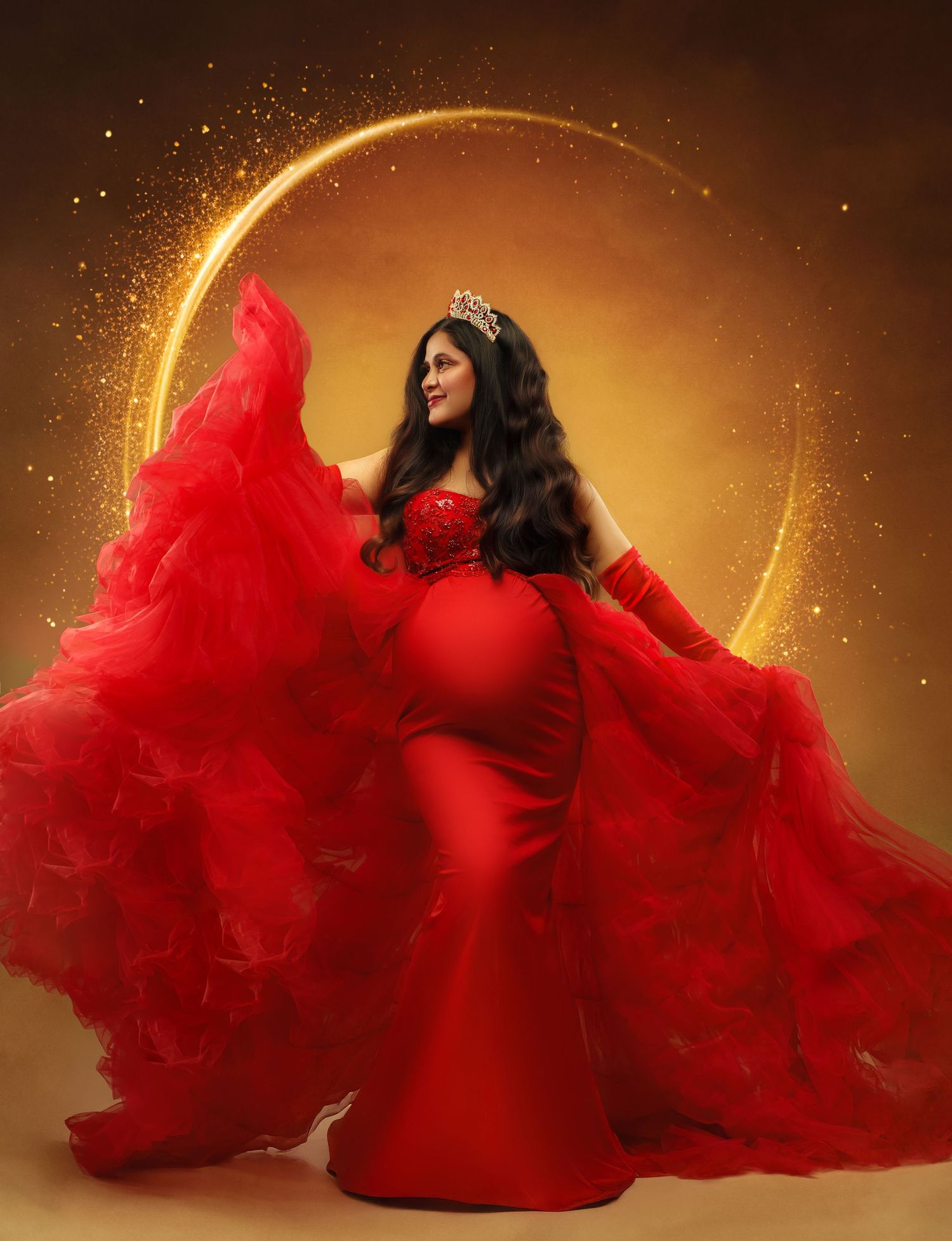 Elegant silhouette poses on golden background wearing flowing red tulle gown with dramatic billowing skirt.