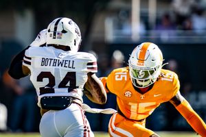 College football players compete during an intense game between Tennessee and Texas A&M.
