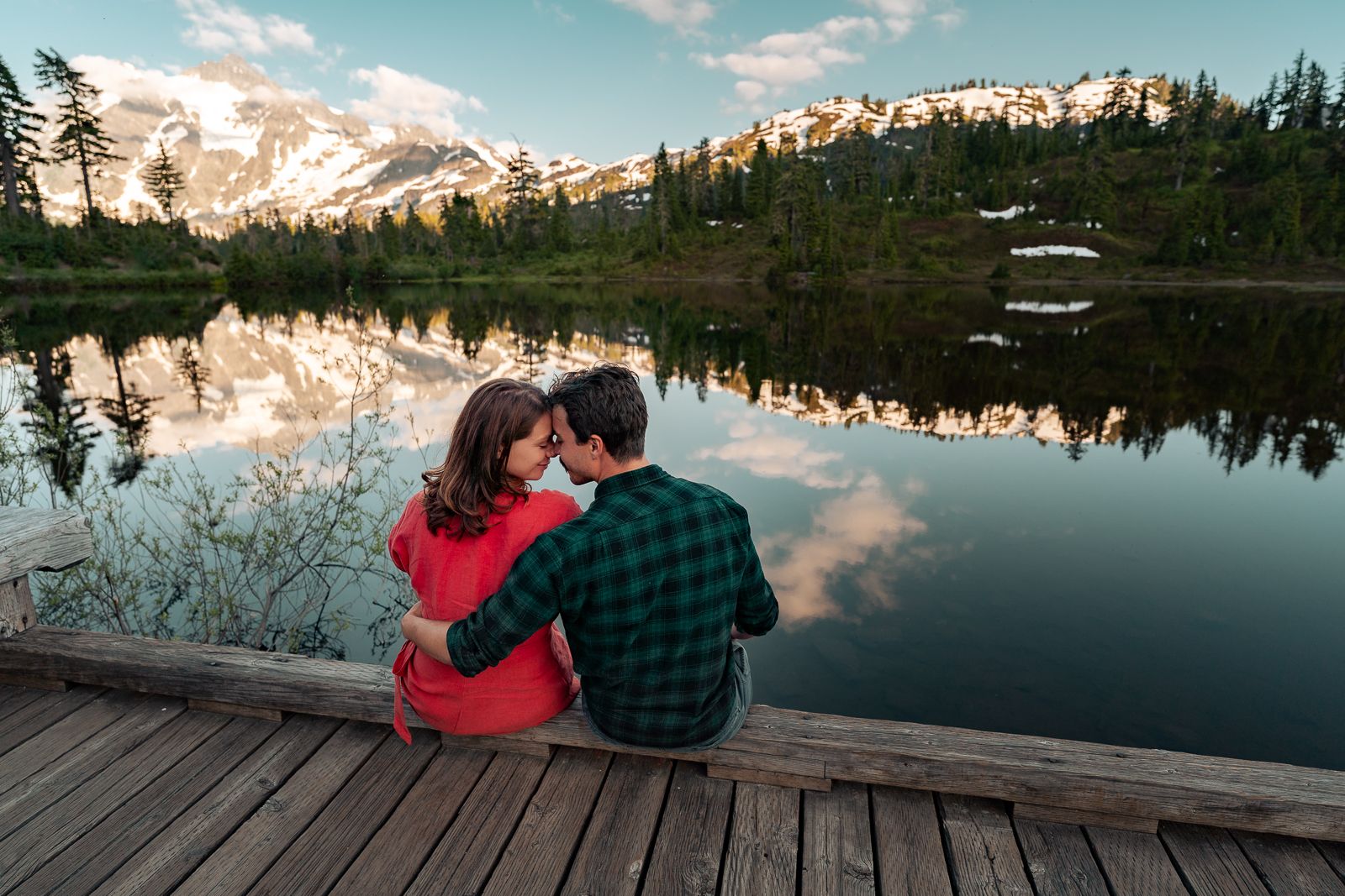 family, professional, photography, outdoor scenic photo session husband wife love hugs kisses flowers greenery forest washington engagement