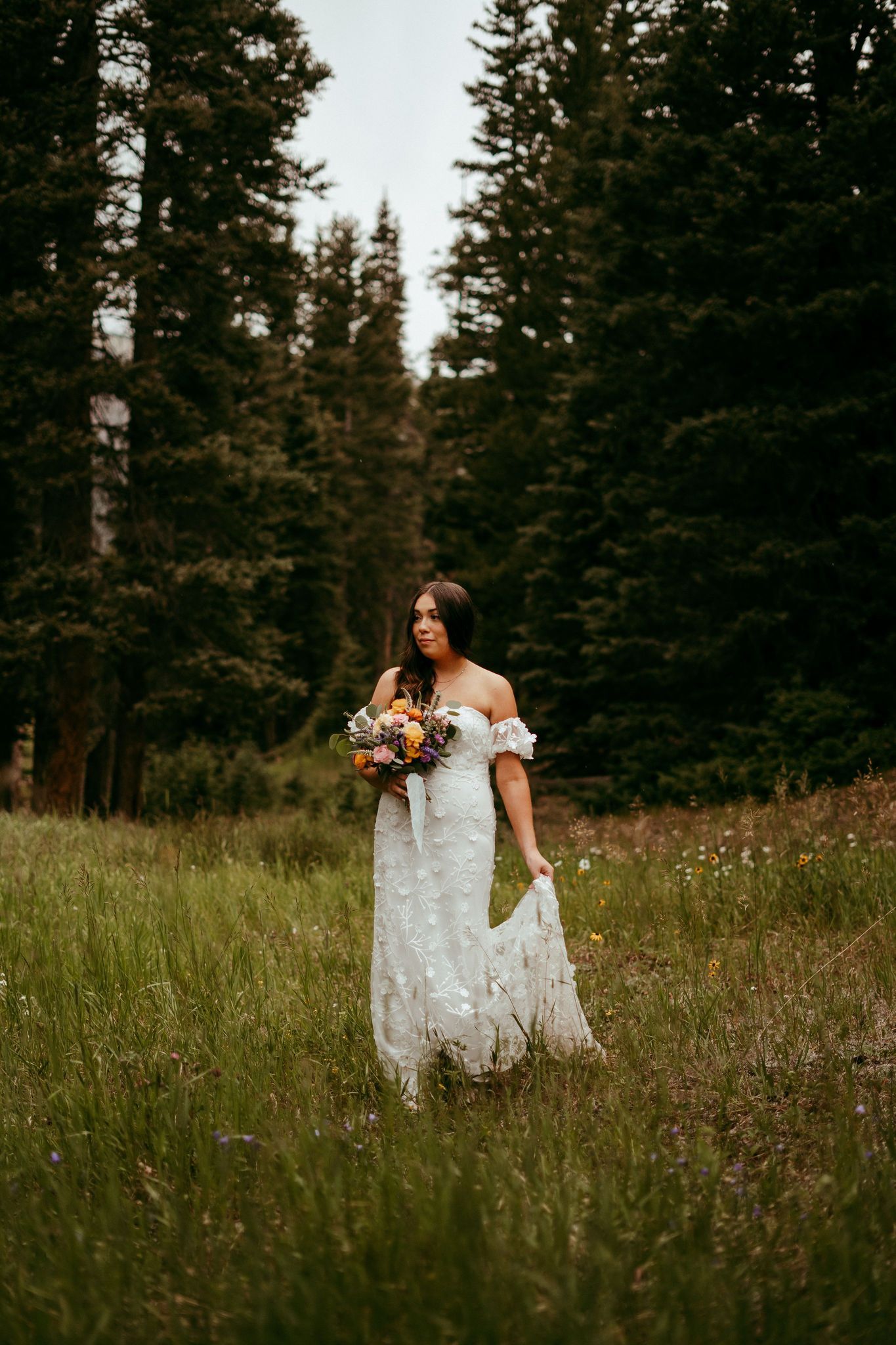 Outdoor wedding ceremony in Wyoming with mountain views and rustic charm