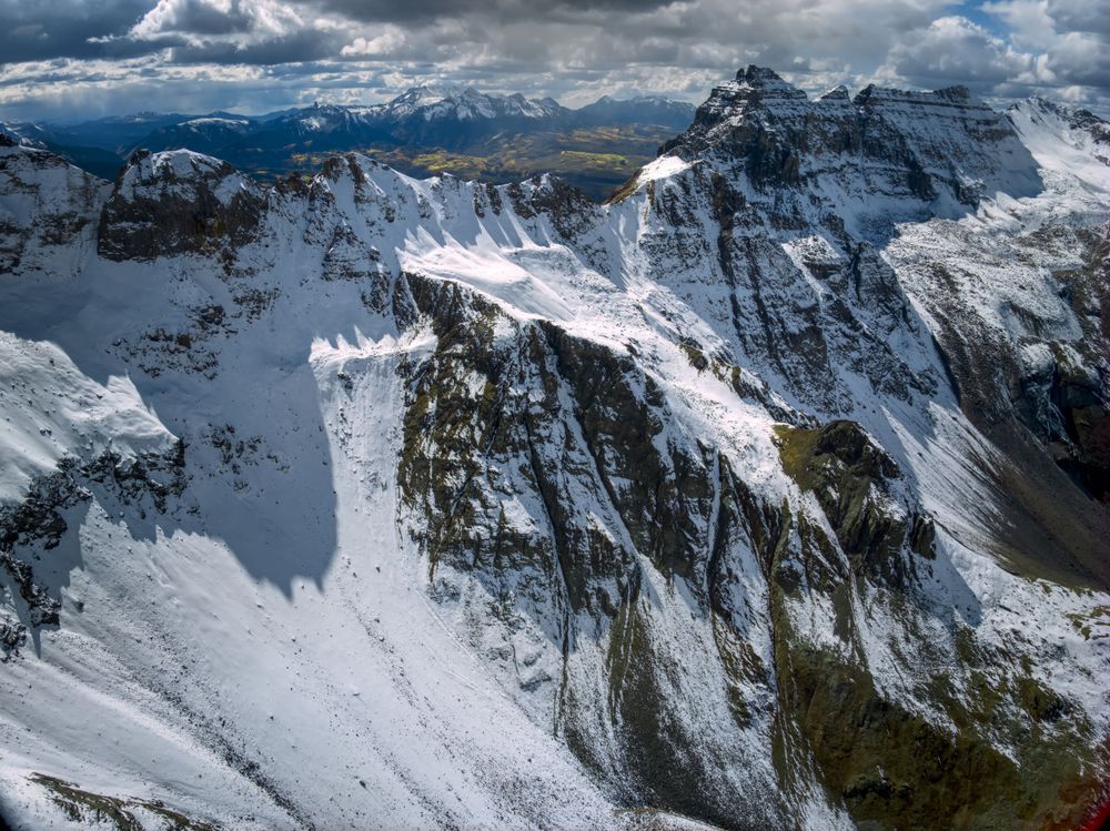 Snowy peaks of a mountain range.