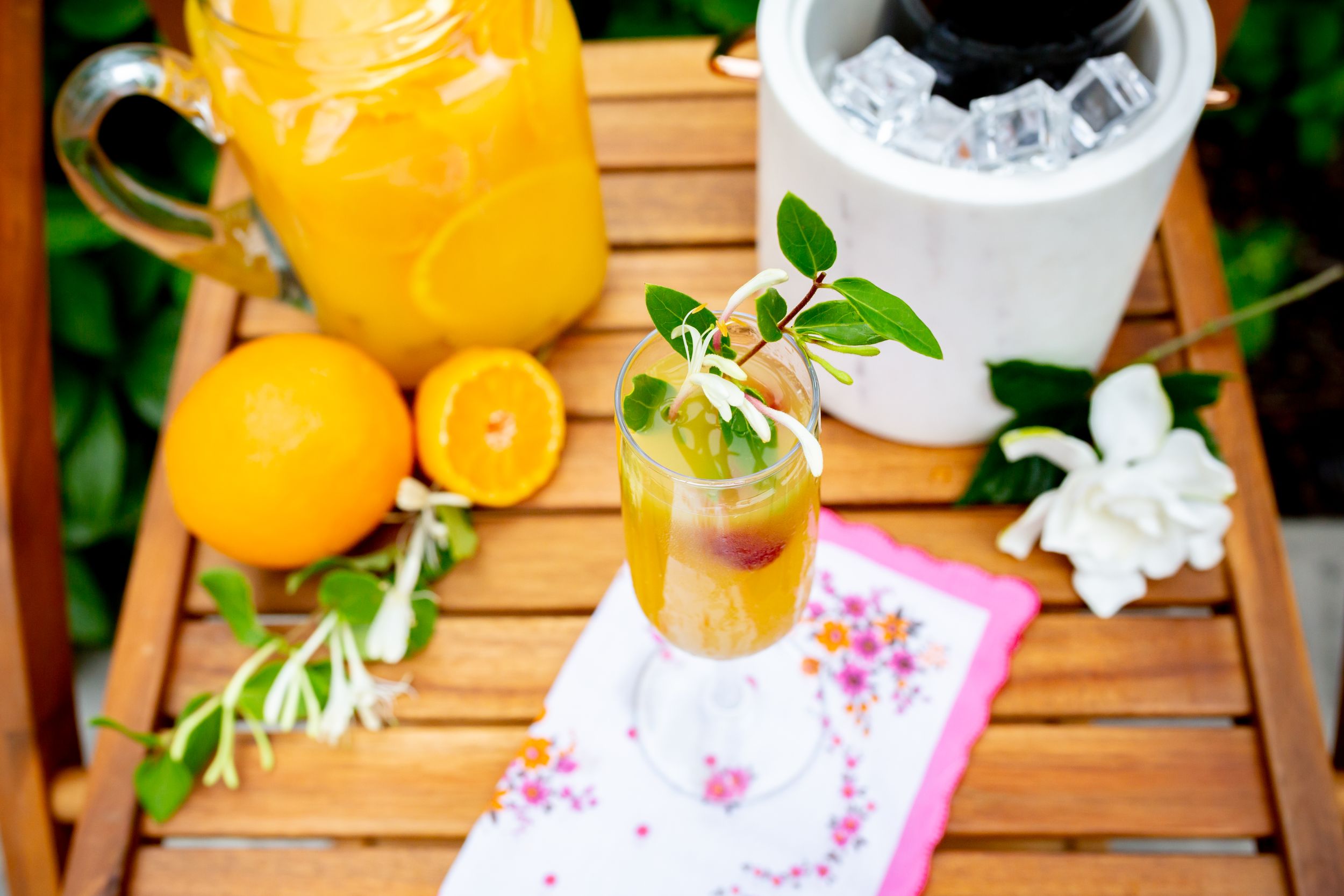 Fresh citrus lemonade with mint garnish and ice served on wooden tray with floral napkin.
Commercial Photography
HGTV