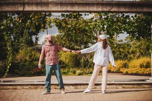 A series of cropped photos showing feet and legs dancing together in an outdoor setting during golden hour.