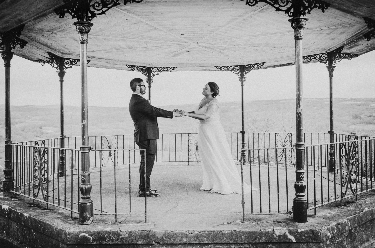 Wedding day couple dancing on a band stand.
