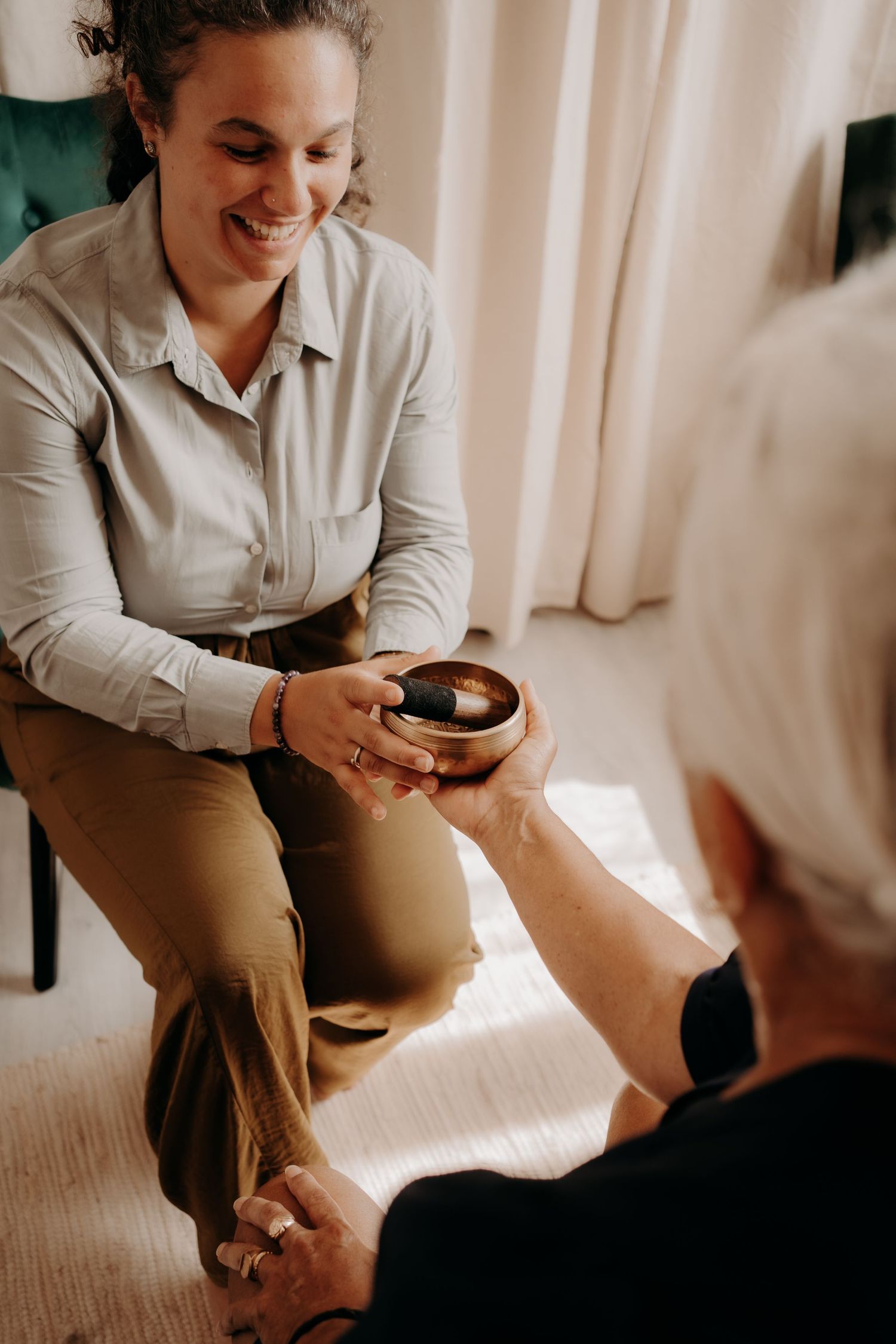 Professional wellness consultation session in a bright, modern office setting.