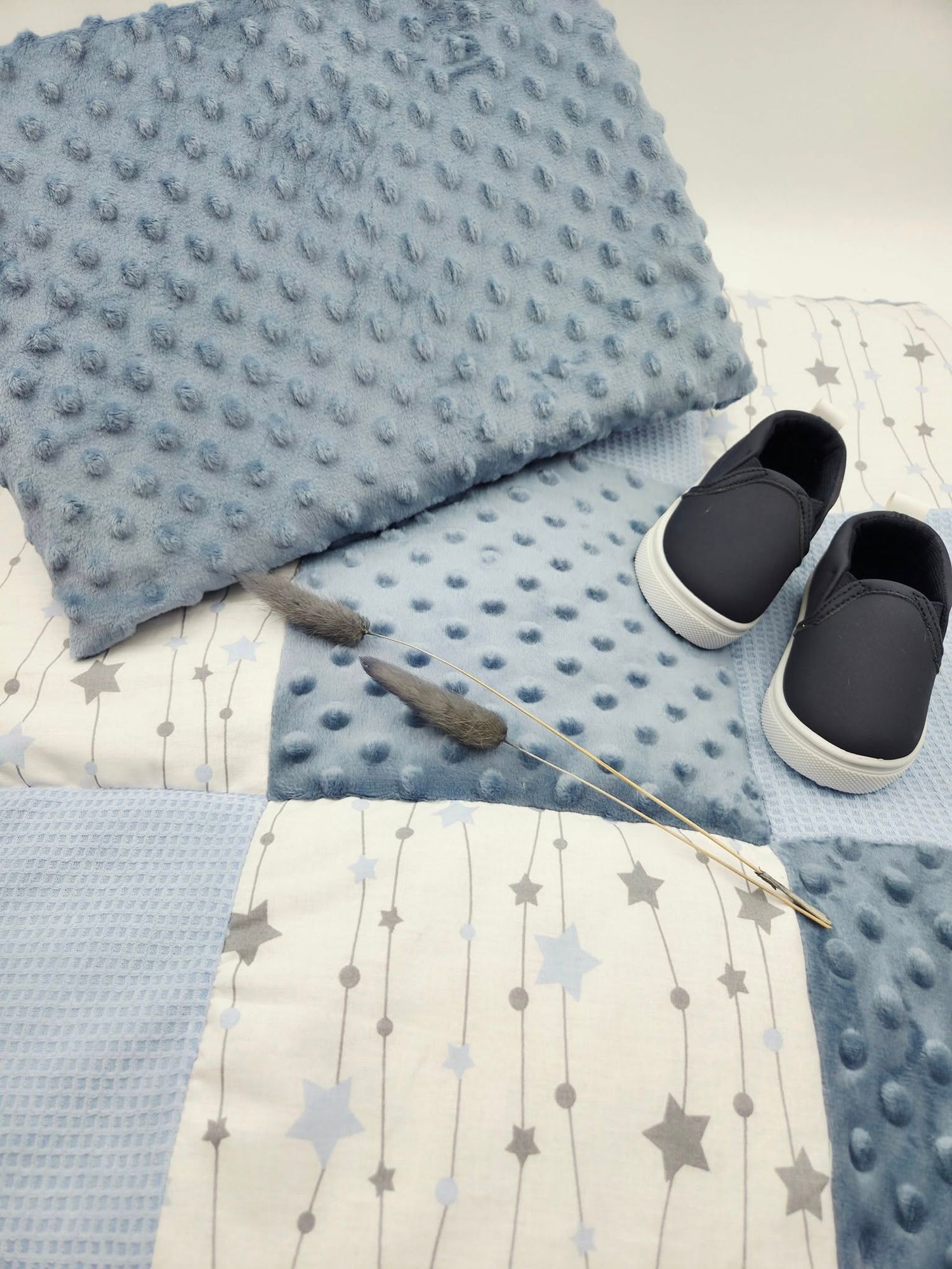 Light blue minky dot blanket set with star pattern fabric and navy shoes.