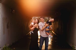 Family portraits captured in warm ambient lighting with natural expressions.