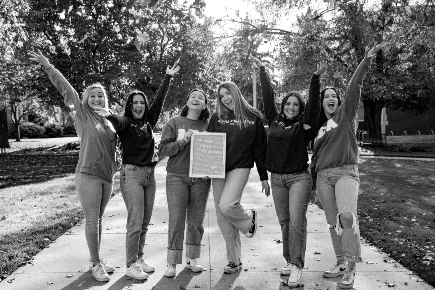 A group of grads cheering