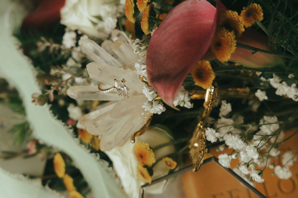 Details photo of bridal bouquet and wedding ring by Lemon & Honey Co.