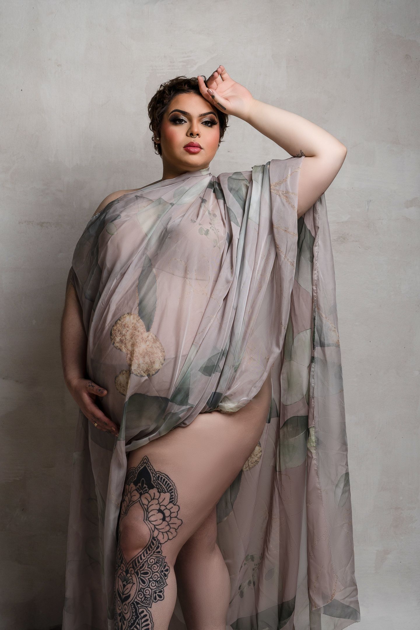 Mother to be covered in floral cloth. Chicago Maternity Photographer