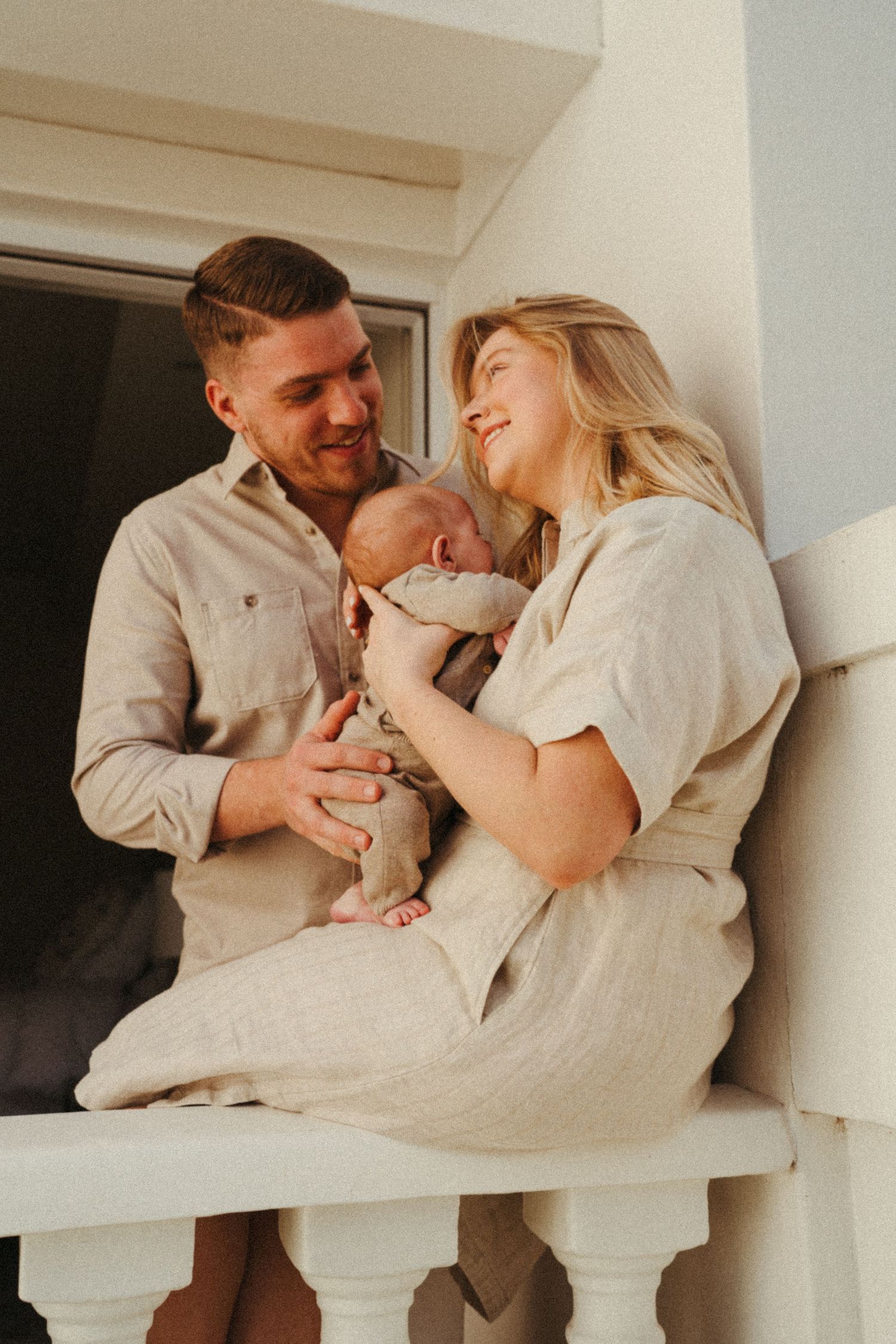 Candid family moments captured in a series of natural light photos.