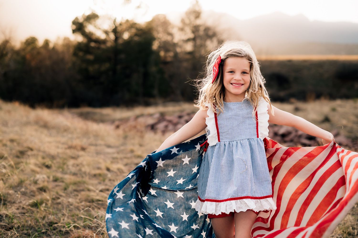 Patriotic rustic outdoor photos featuring American flag and fields at sunset with golden seasonal lighting.
