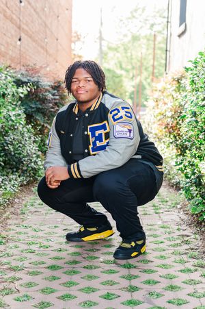 Senior guy posing in walkway, senior session Senoia GA