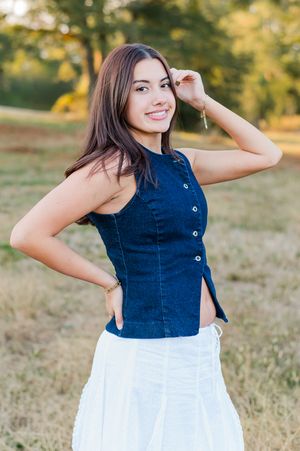Senior girl posing standing in a field, Sharpsburg, GA