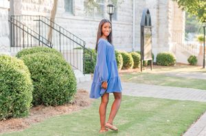 Senior girl posing in front of Central Baptist Church, natural senior session Newnan GA
