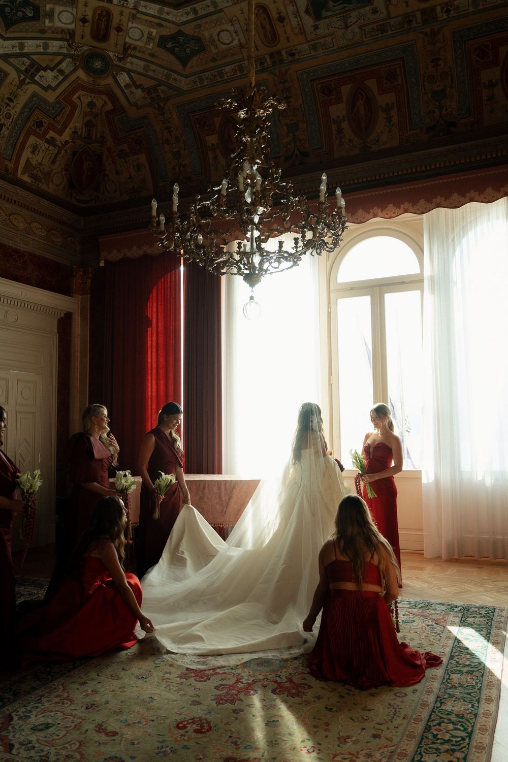 A romantic wedding moment captured in a garden setting with soft natural lighting and white floral bouquet.