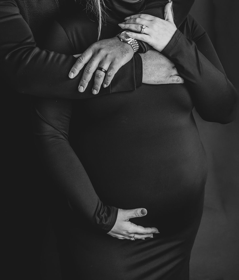 A series of black and white cropped photos showing hands in formal attire resting on legs and laps.