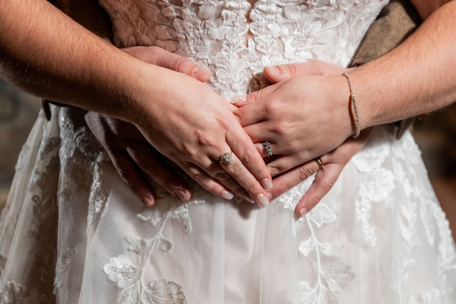 Detail of rings and hands and antiques.