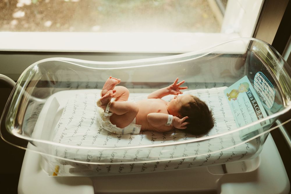 Fresh 48 session by Dayton, Ohio based newborn photographer Disney Magic Photography, serving Beavercreek, Bellbrook, Kettering and more.