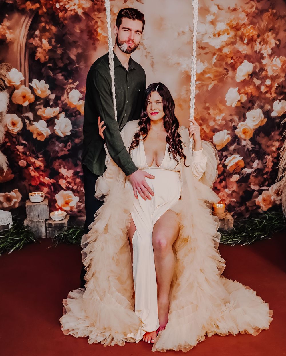 Elegant wedding photoshoot with dramatic floral arrangements and warm lighting.