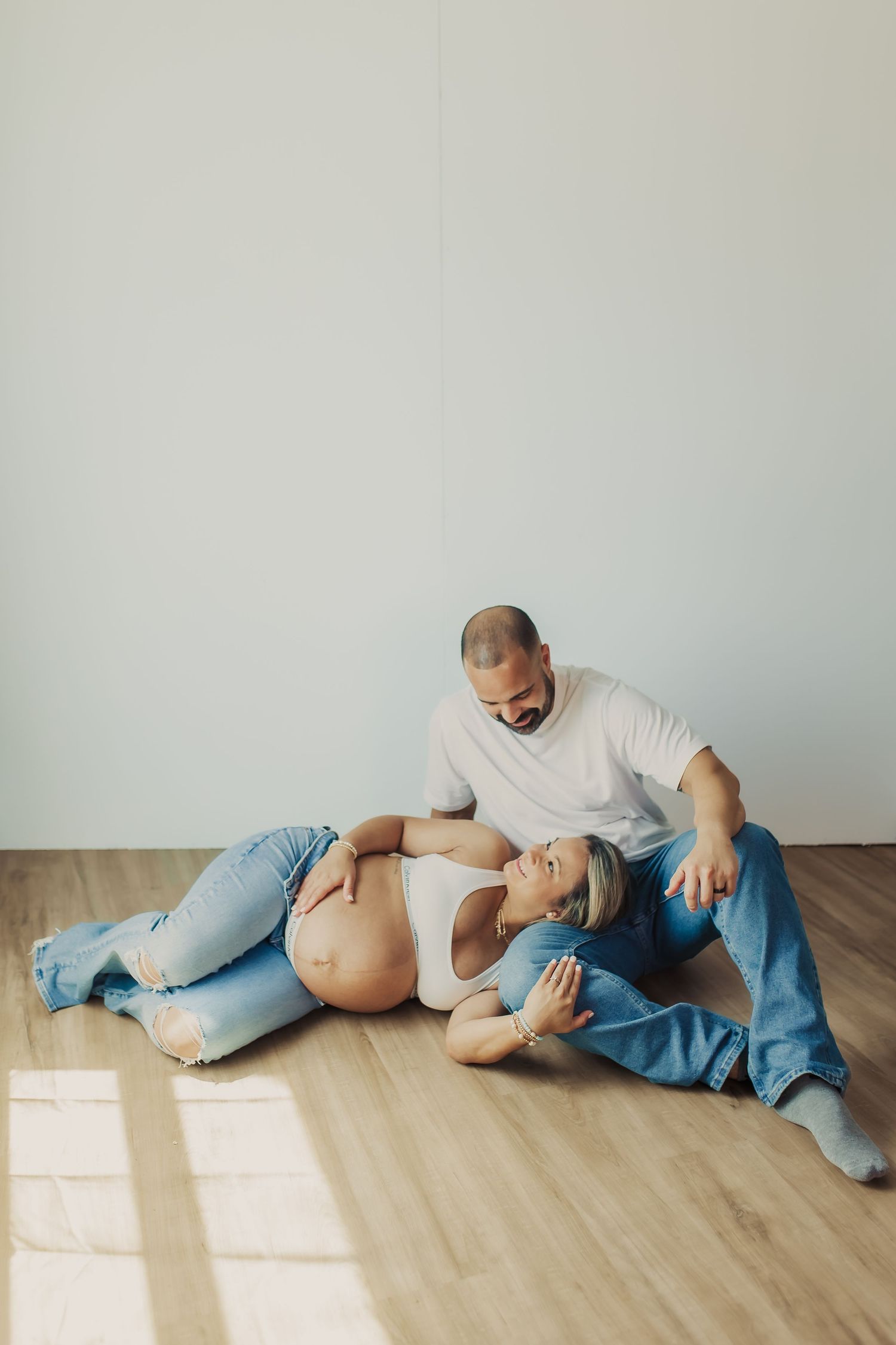 Maternity photo during indoor maternity session in Wimbledon.
