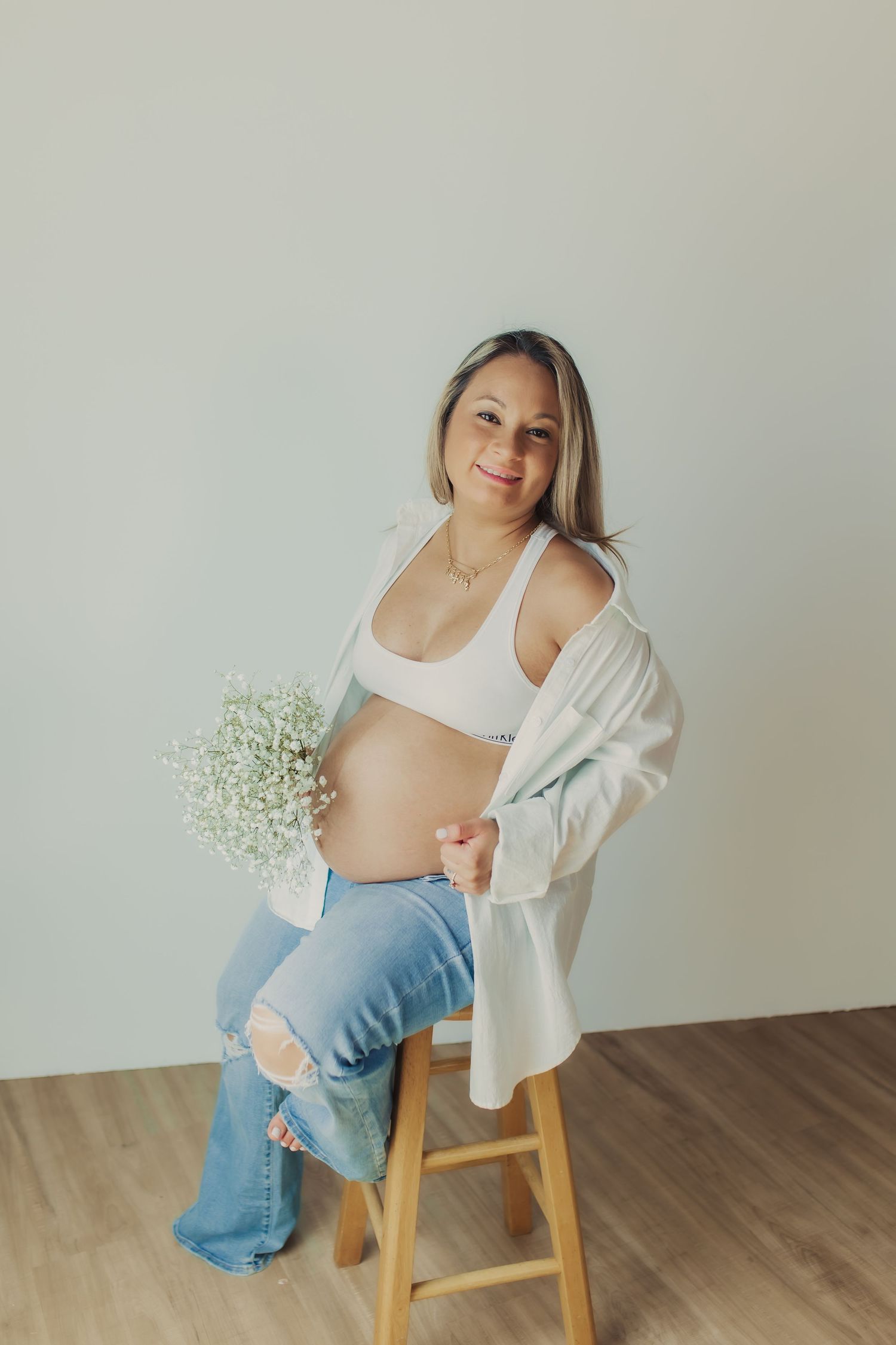 Maternity photo during indoor maternity session in Wimbledon.