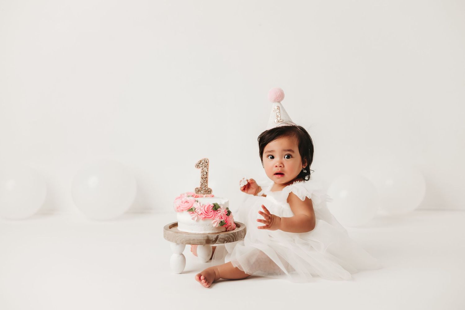 Baby girl cake smash session in Magnolia Texas