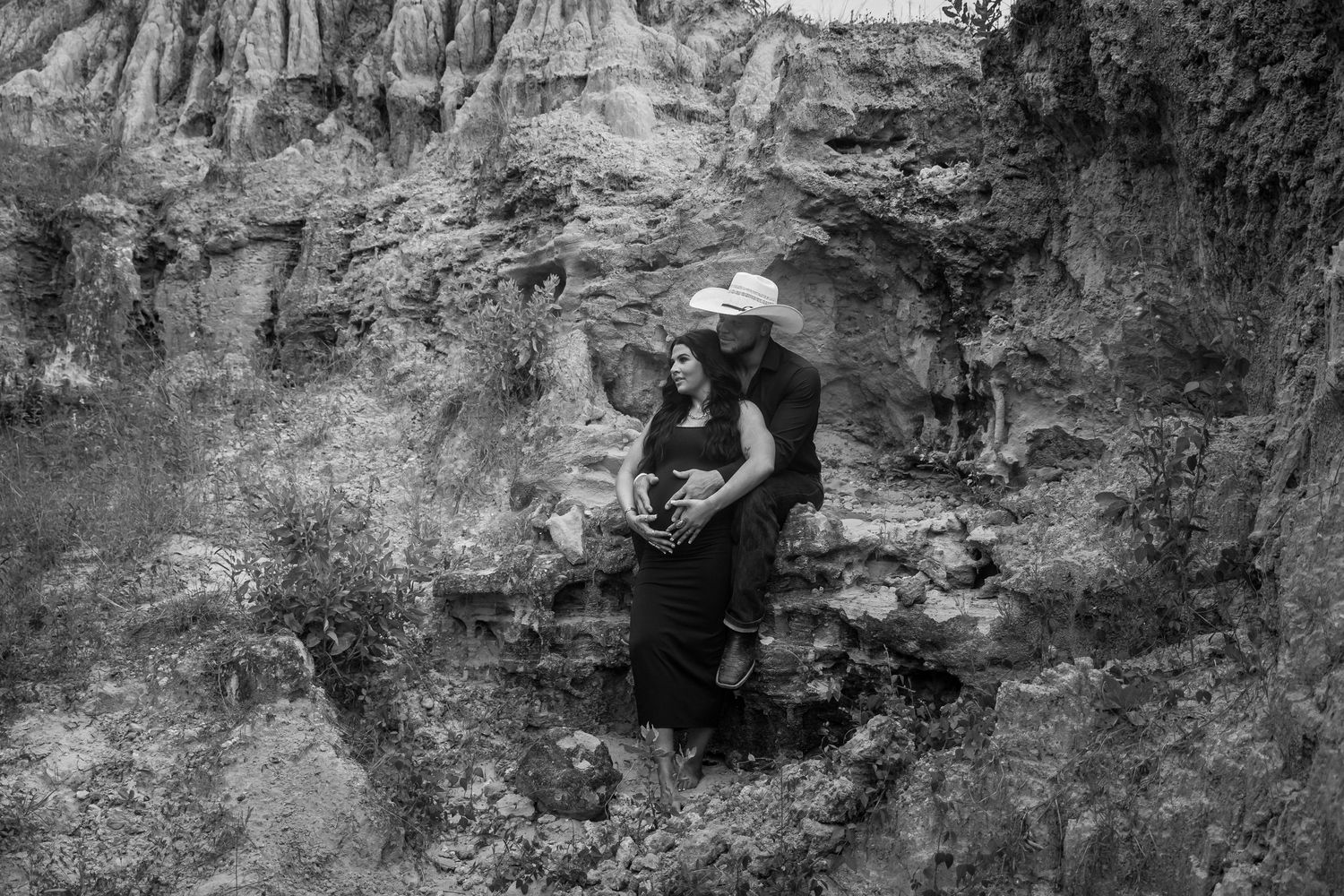 Black and white landscape photos showing rocky cliff formations and natural terrain.