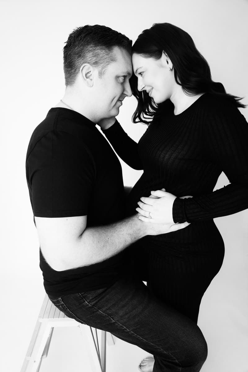 Maternity photos, couple looking at each other