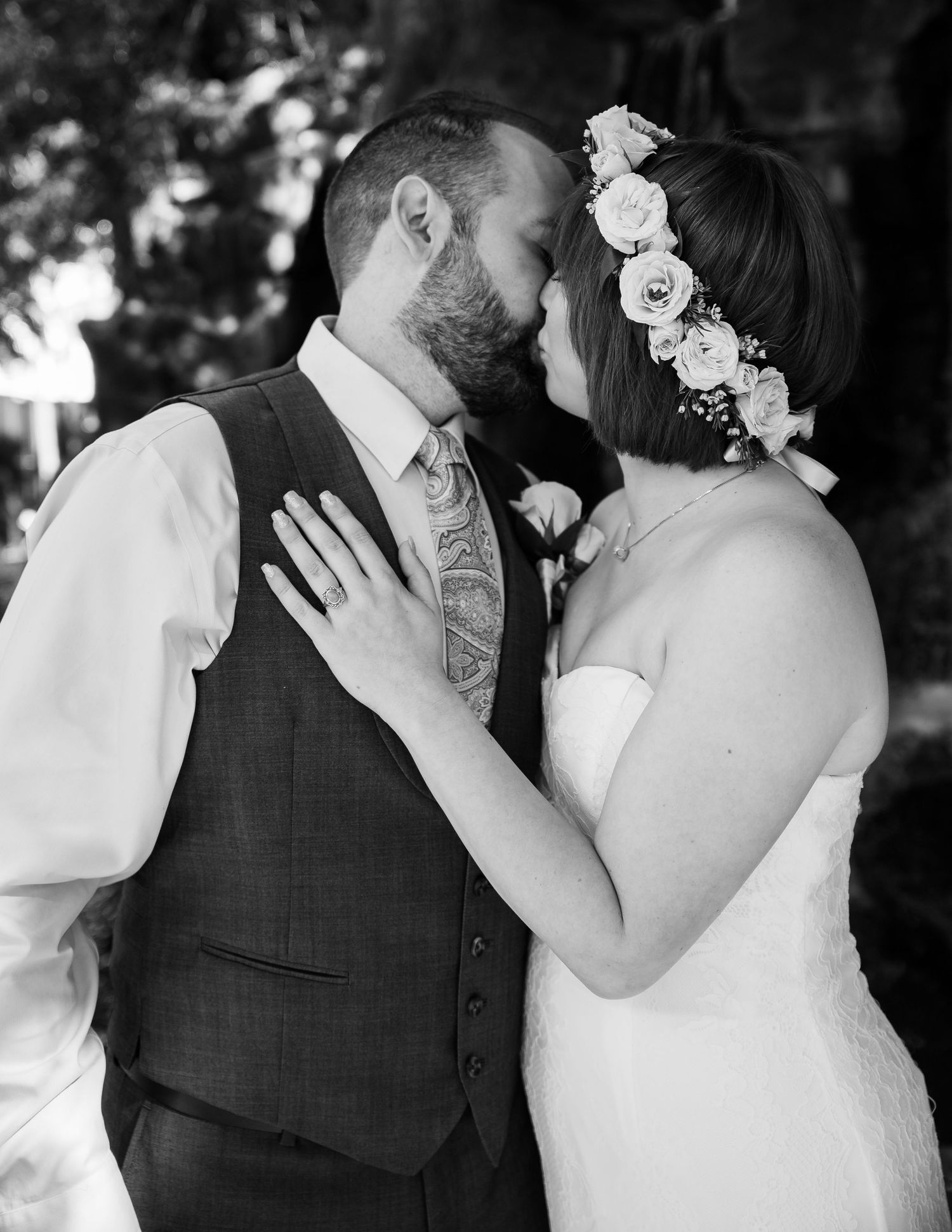 Close-up of engagement ring with her hand resting gently on his chest | Storytelling travel photographer based in Florida.