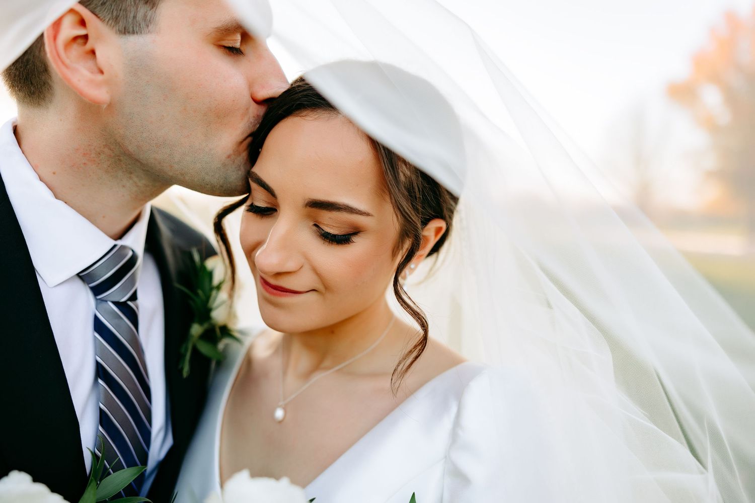 Bride and Groom embracing at Briar Ridge Country Club in Schereville, Indiana.