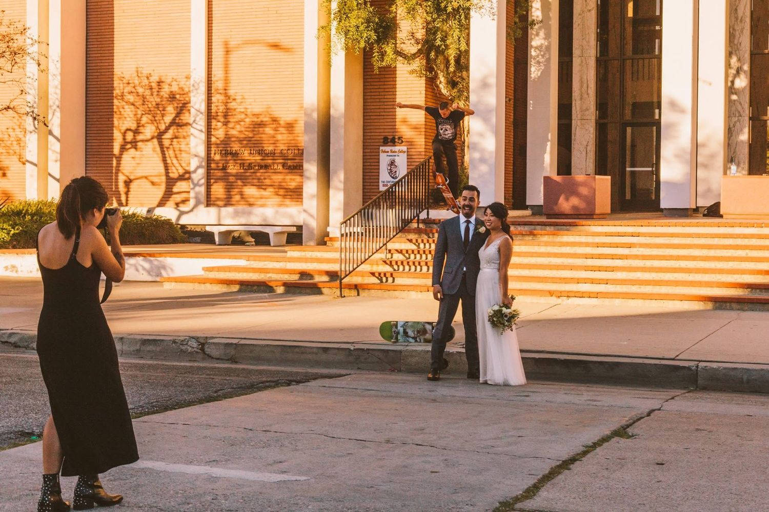 A sunset wedding photo session on the steps of a historic building.