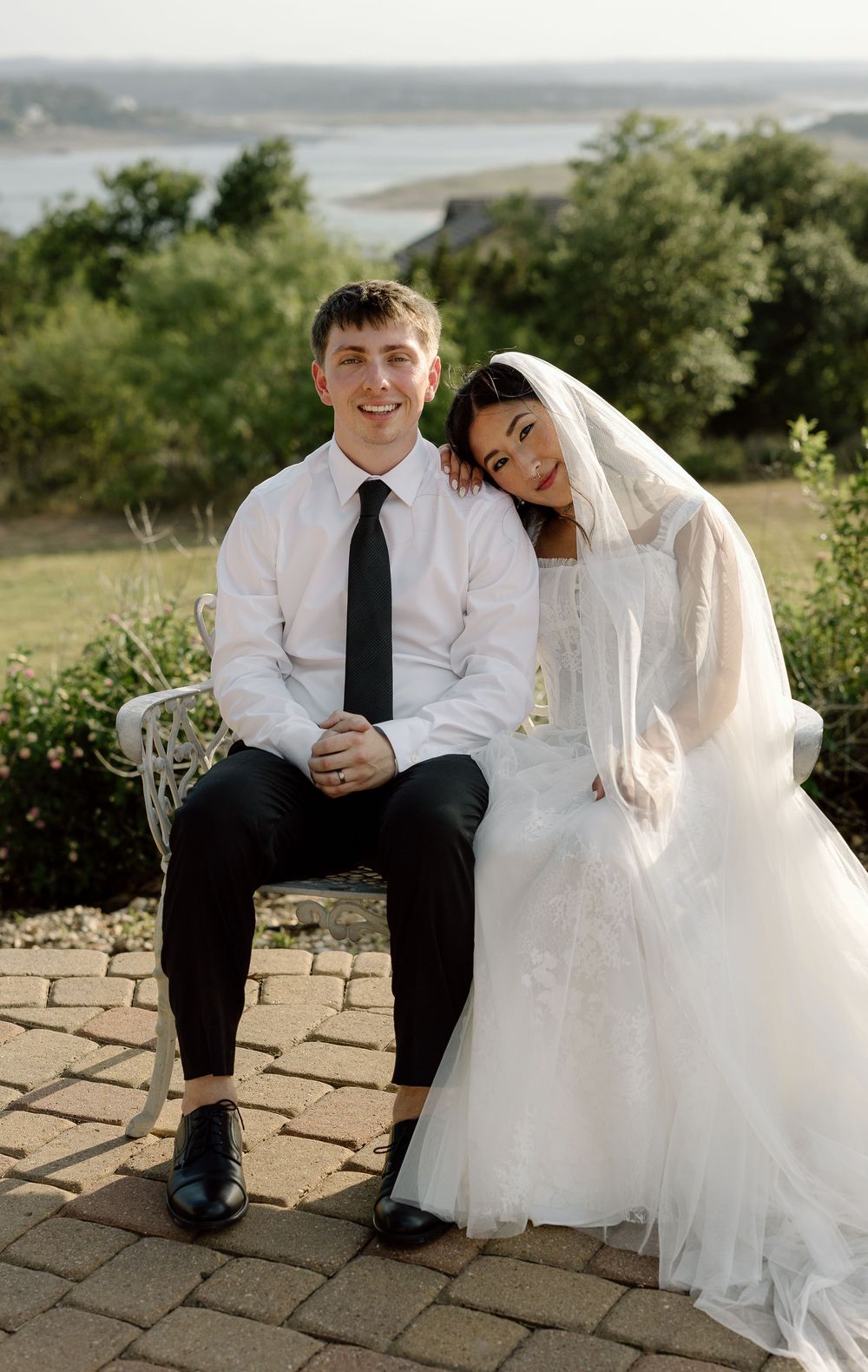 A romantic collection of wedding photos showing candid moments between newlyweds sitting together on stone steps outdoors.