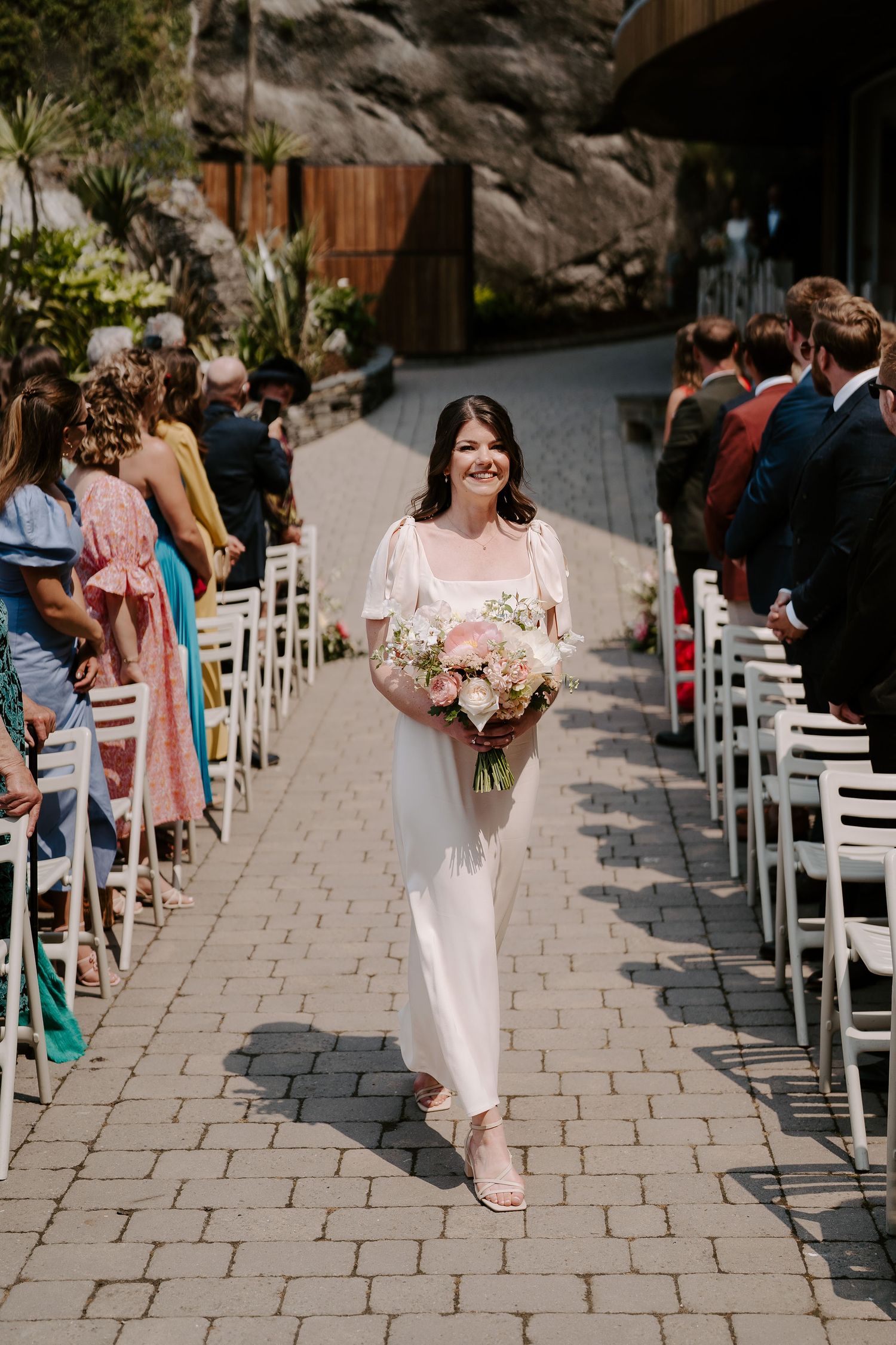 Tunnels Beach Wedding Venue in North Devon, Bridesmaids walking down the aisle