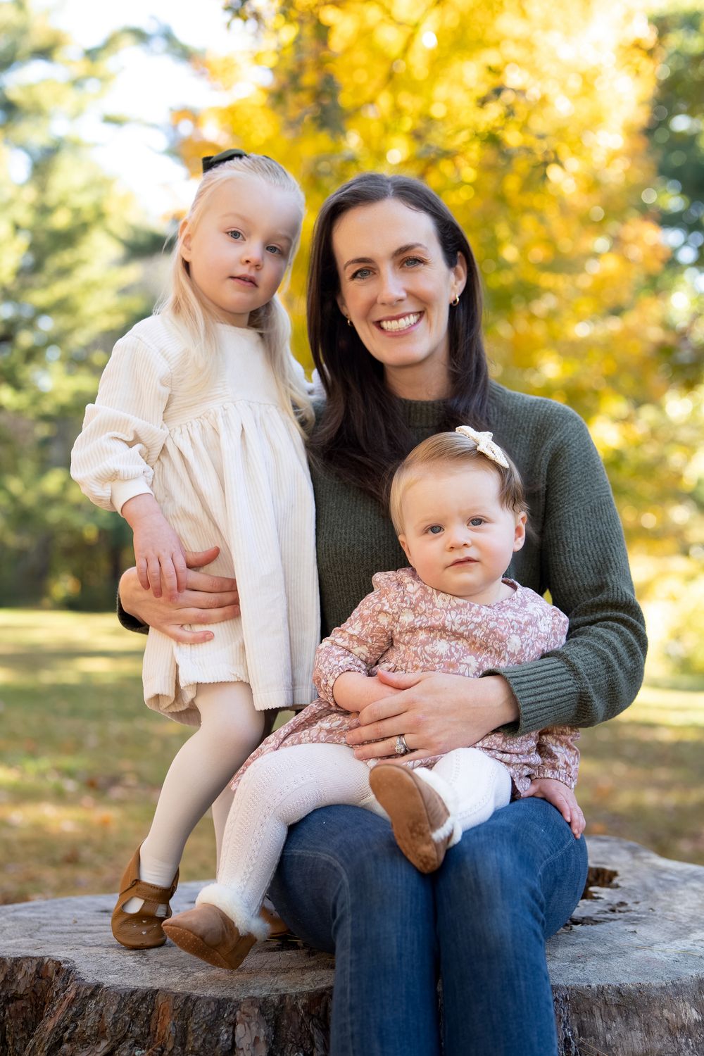 Mother & daughters family portraits in New England Fall Foliage. Photography by Leah Ramuglia at the Wayside Inn Grist Mill in Sudbury, MA.