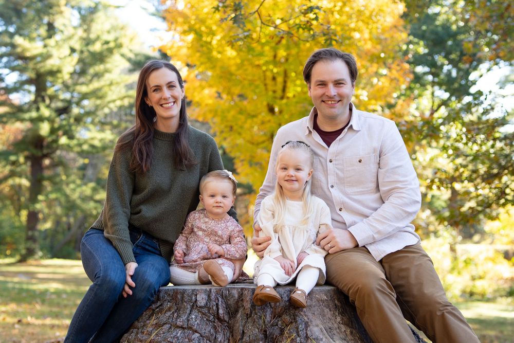 Family Portraits at the Wayside Inn Grist Mill in Sudbury surrounded by fall foliage. Photography by Leah Ramuglia.