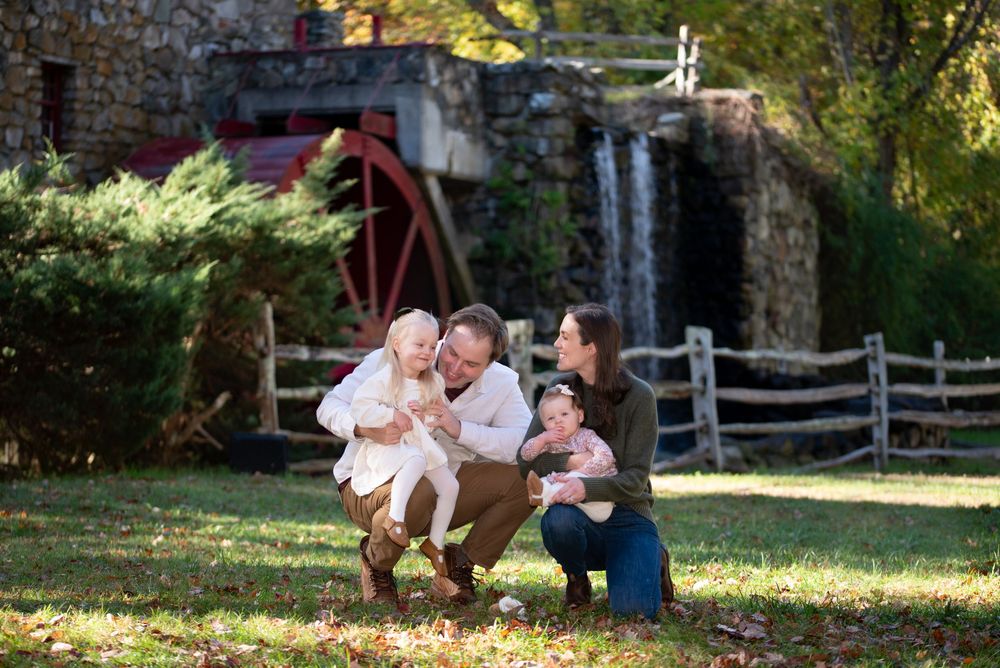 Family fun at the Wayside Inn Grist Mill in Sudbury surrounded by fall foliage. Photography by Leah Ramuglia.