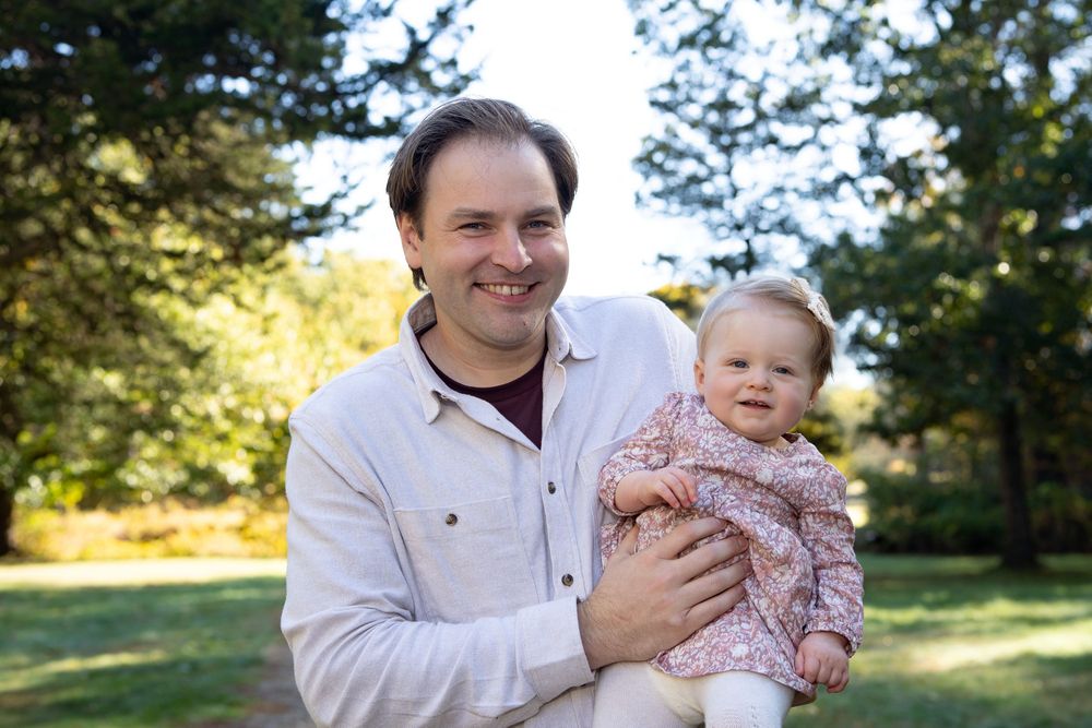 Father & daughter family portraits in New England Fall Foliage. Photography by Leah Ramuglia at the Wayside Inn Grist Mill in Sudbury, MA.