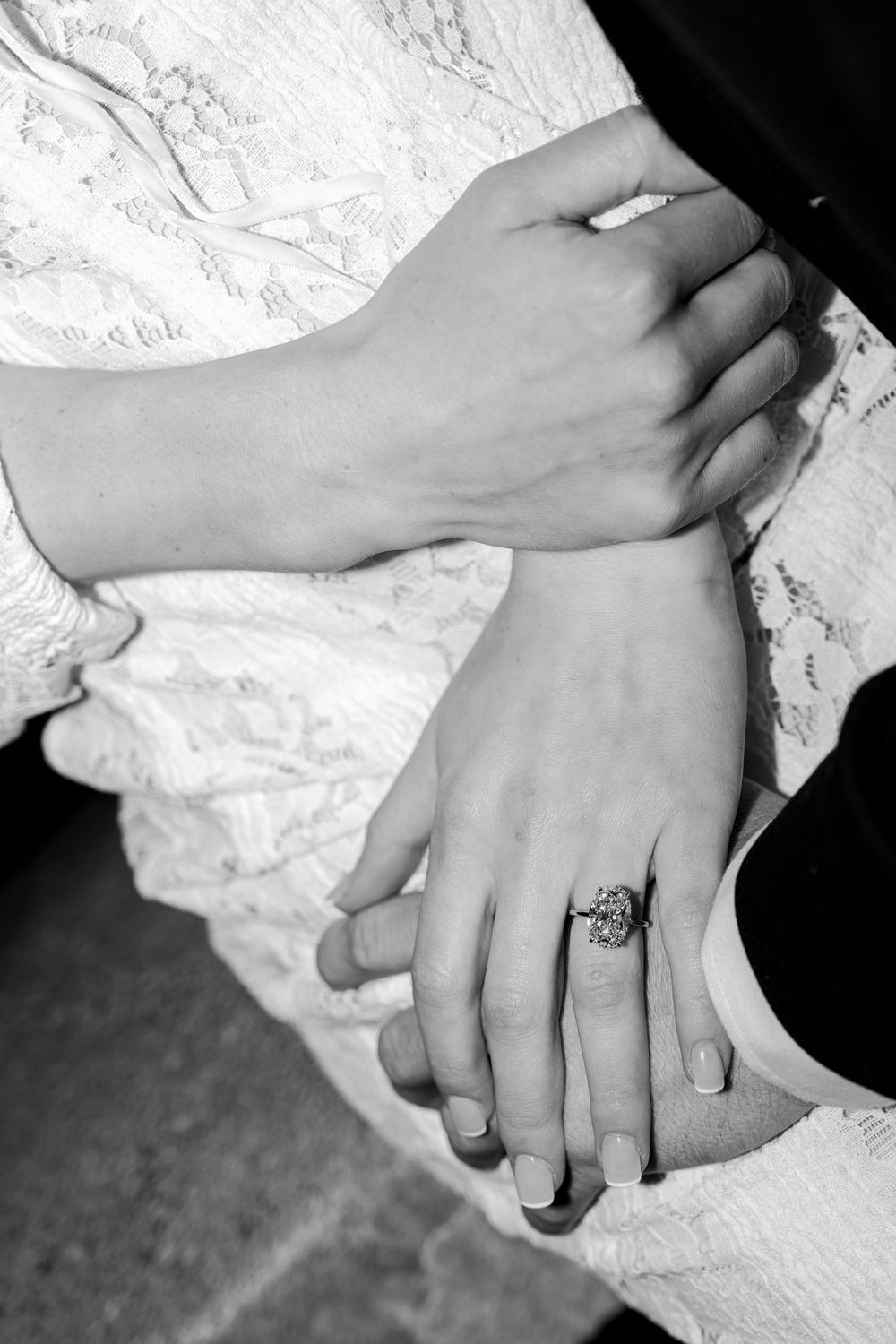 A series of black and white close-up photographs showing hands with wedding rings. Paris film photographer.