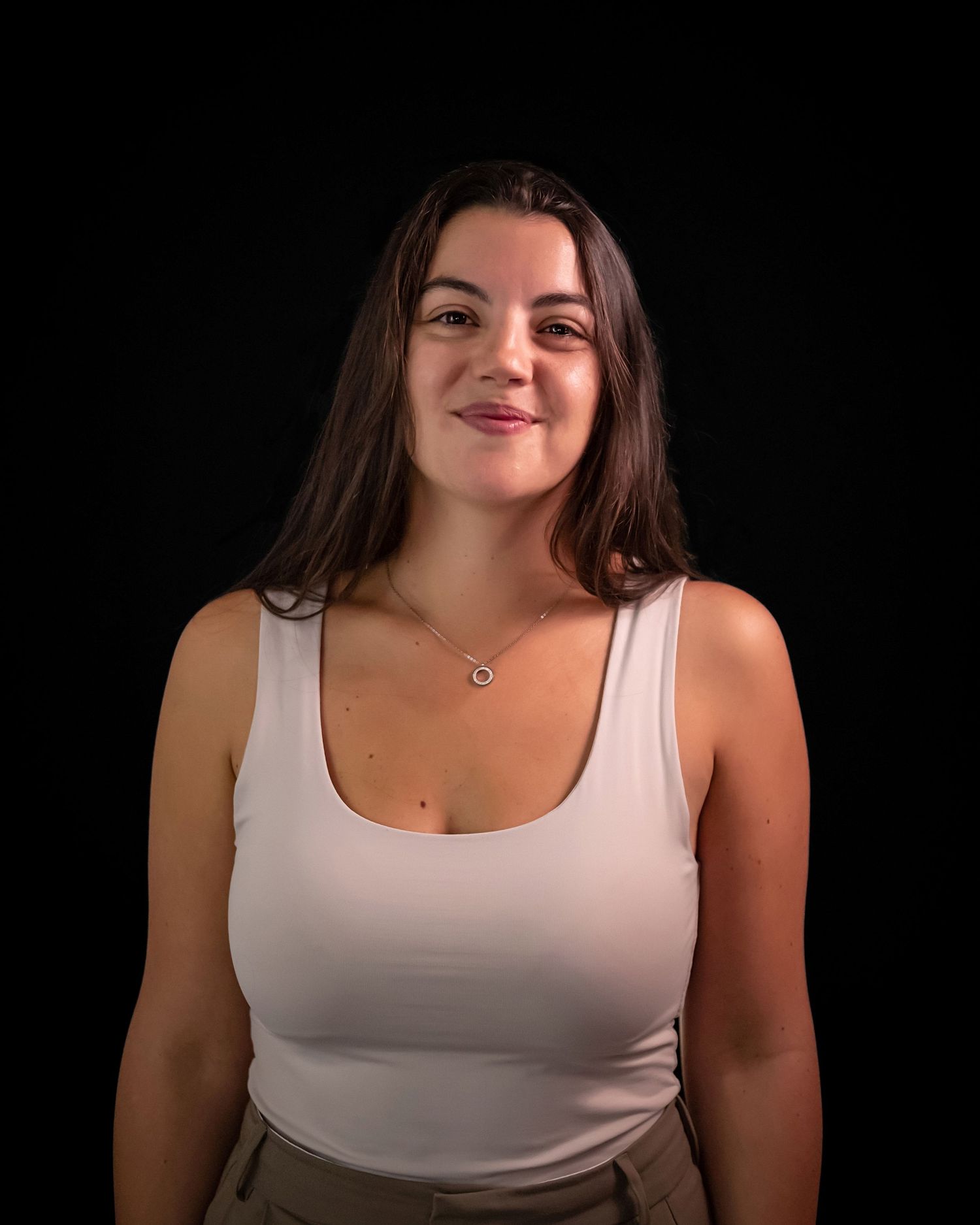 Studio portrait sequence against black background showing different poses.