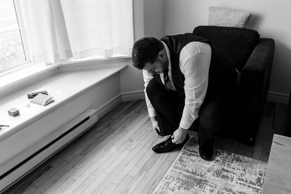A sequence of black and white photos showing a person cleaning and maintaining hardwood floors.