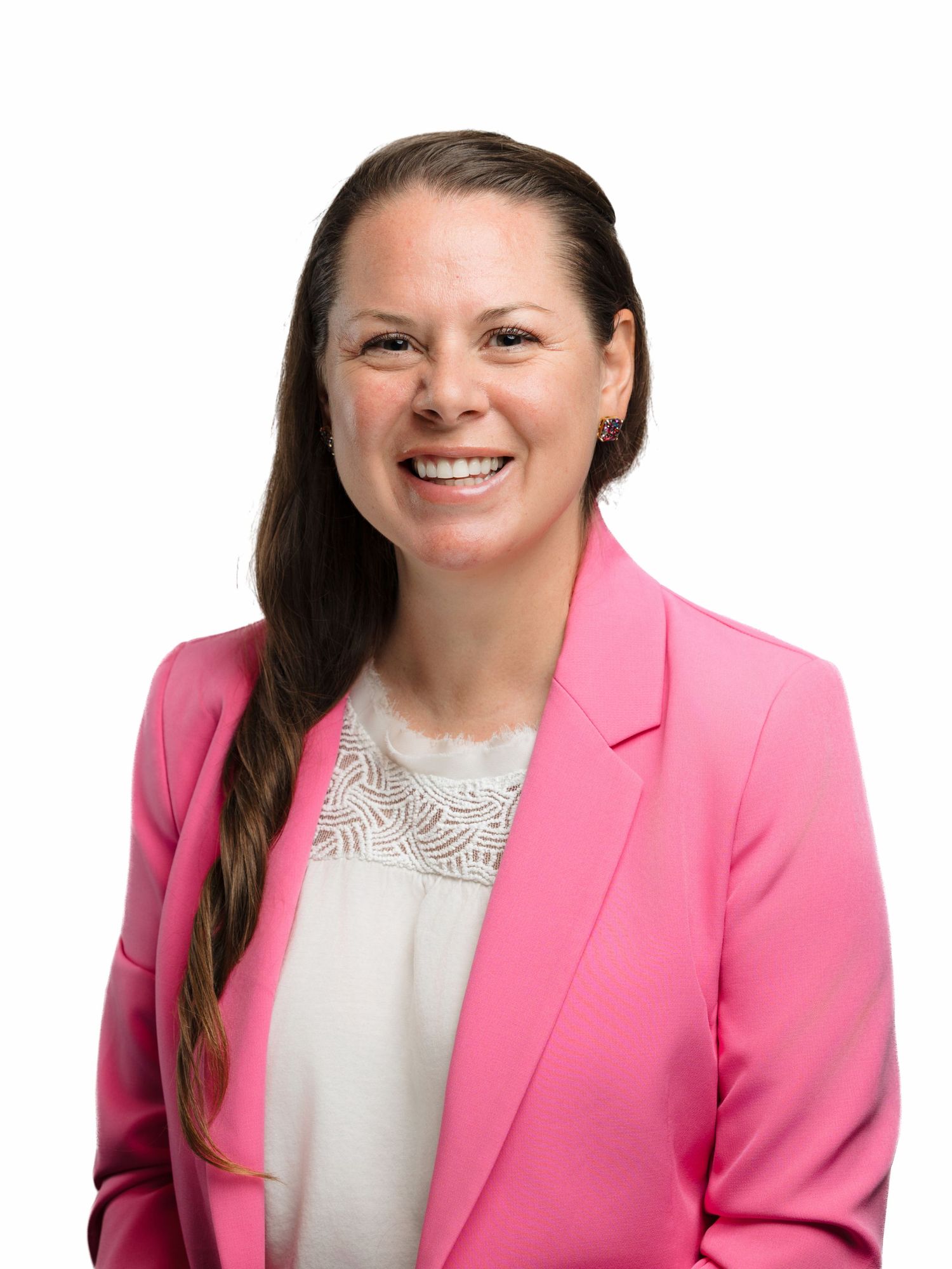 Professional portrait series showing bright pink blazer against white background with warm smile.