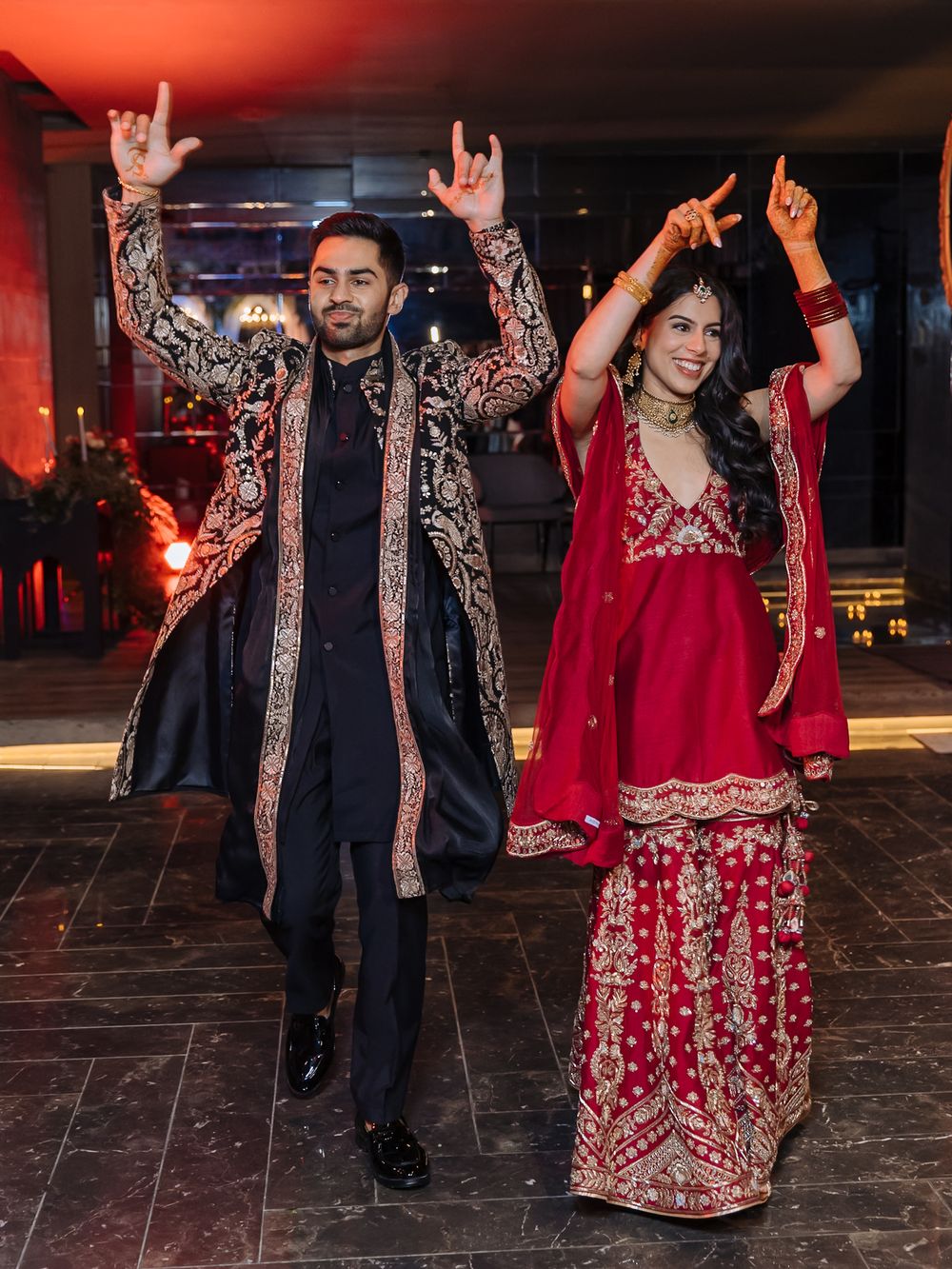 Shorye and Leah at their high-energy Indian wedding Sangeet celebration at Tivoli Chattarpur