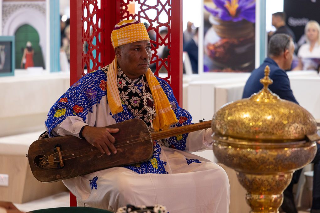 A performer playing a cultural Moroccan instrument at the 2025 WTM in London.