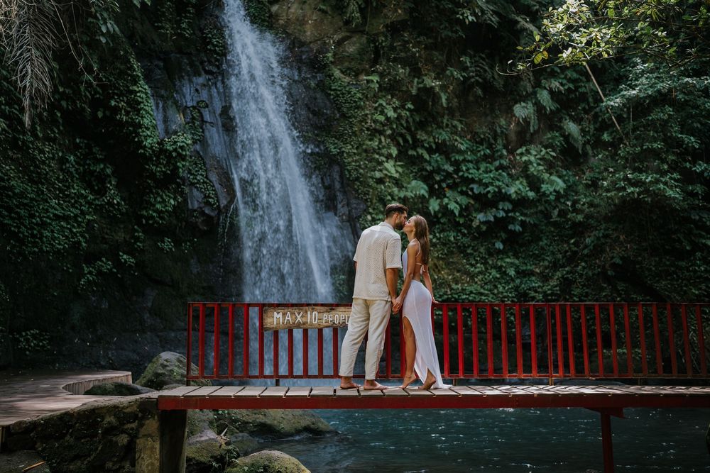 Bali couple photoshoot with waterfall background