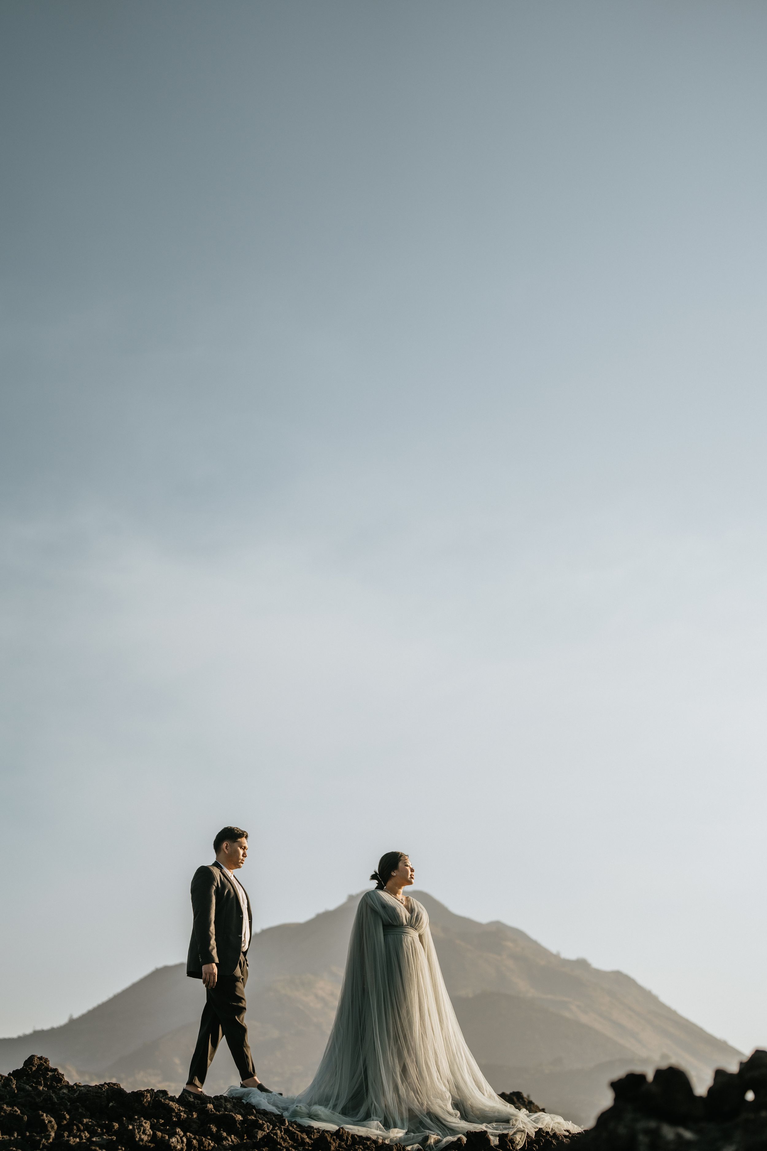 Prewedding couple photography in Bali with mountain backround
