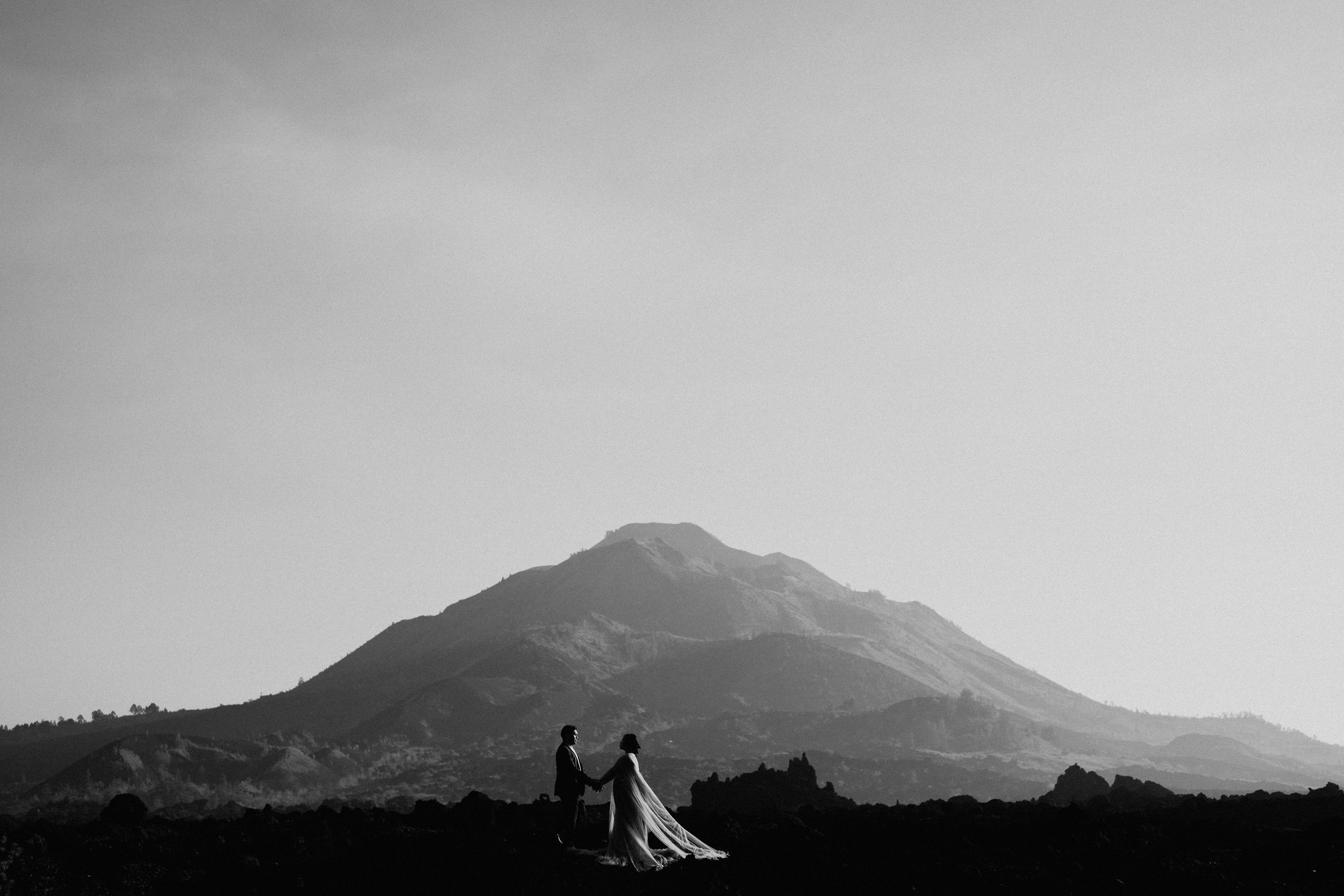 Prewedding couple photography in Bali with mountain backround
