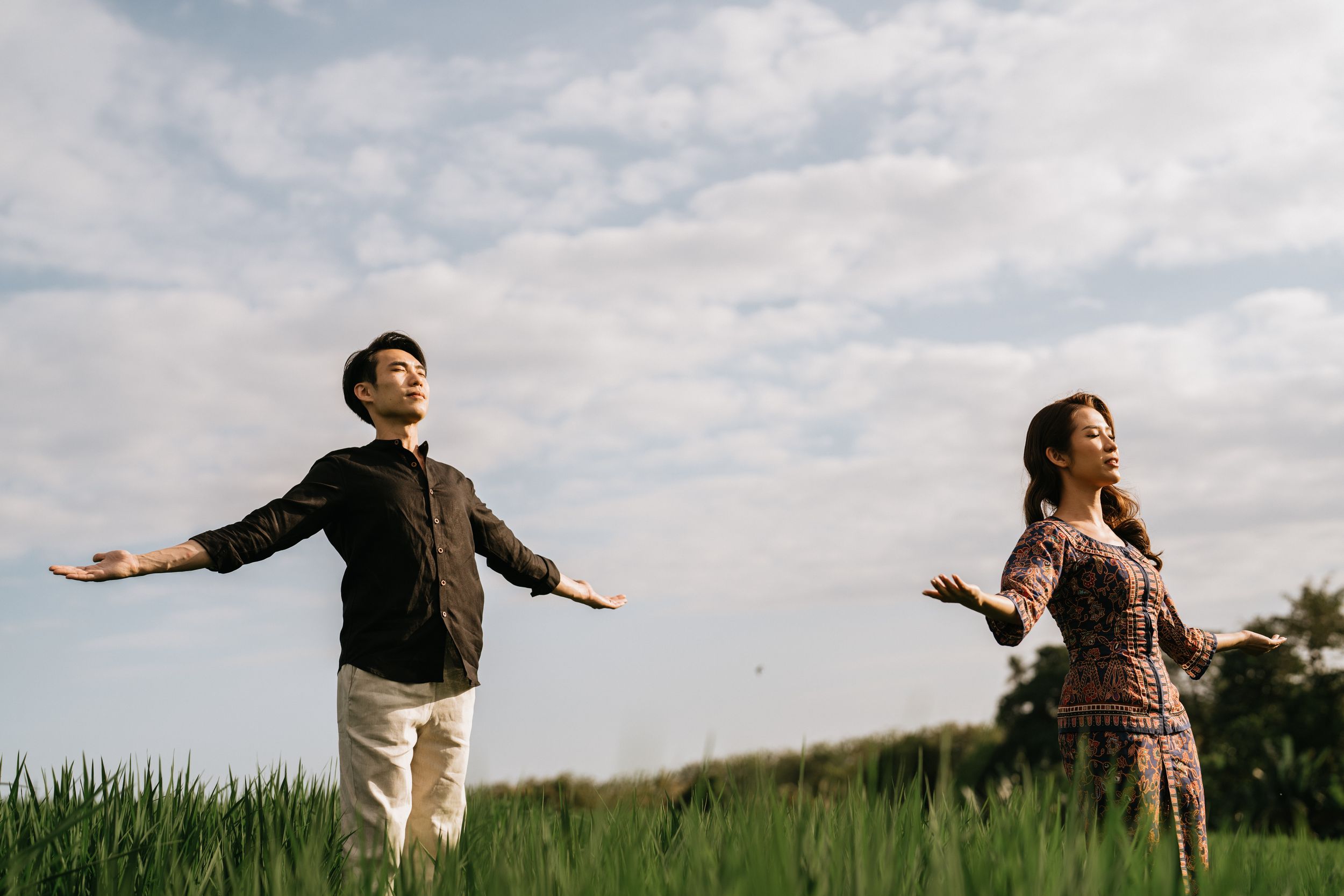 Professional prewedding photoshoot with natural rice field ambience