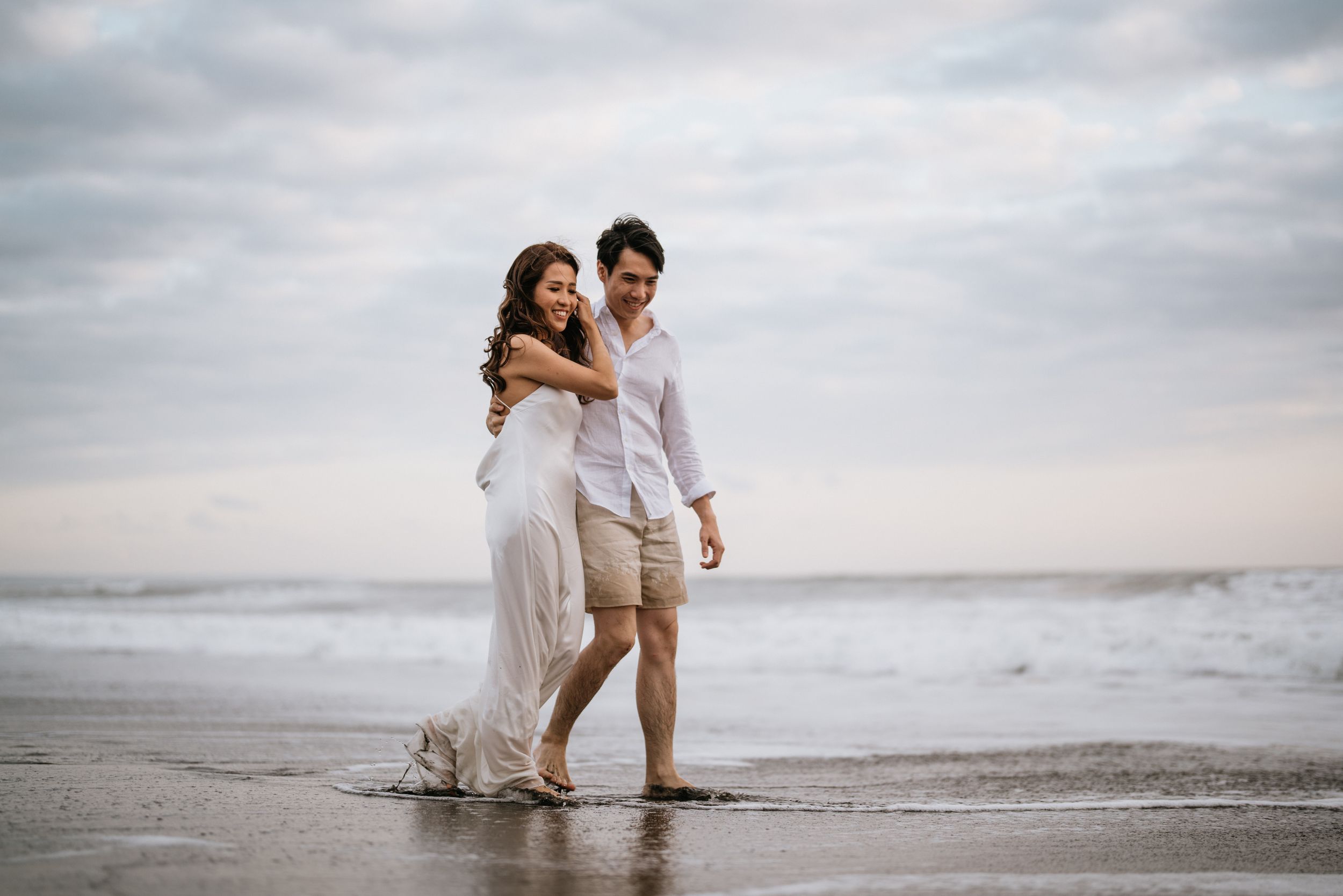 Professional prewedding photoshoot with natural beach ambience