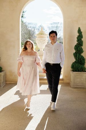 A sequence of photos showing a couple dancing together in a sunlit colonnade with white columns and potted plants.